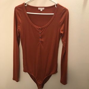 Burnt Orange Long Sleeved Body Suit